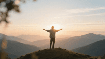 A person standing on a hill